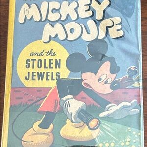 Mickey Mouse & The Stolen Jewels and a little book number 1464 circa 1940s